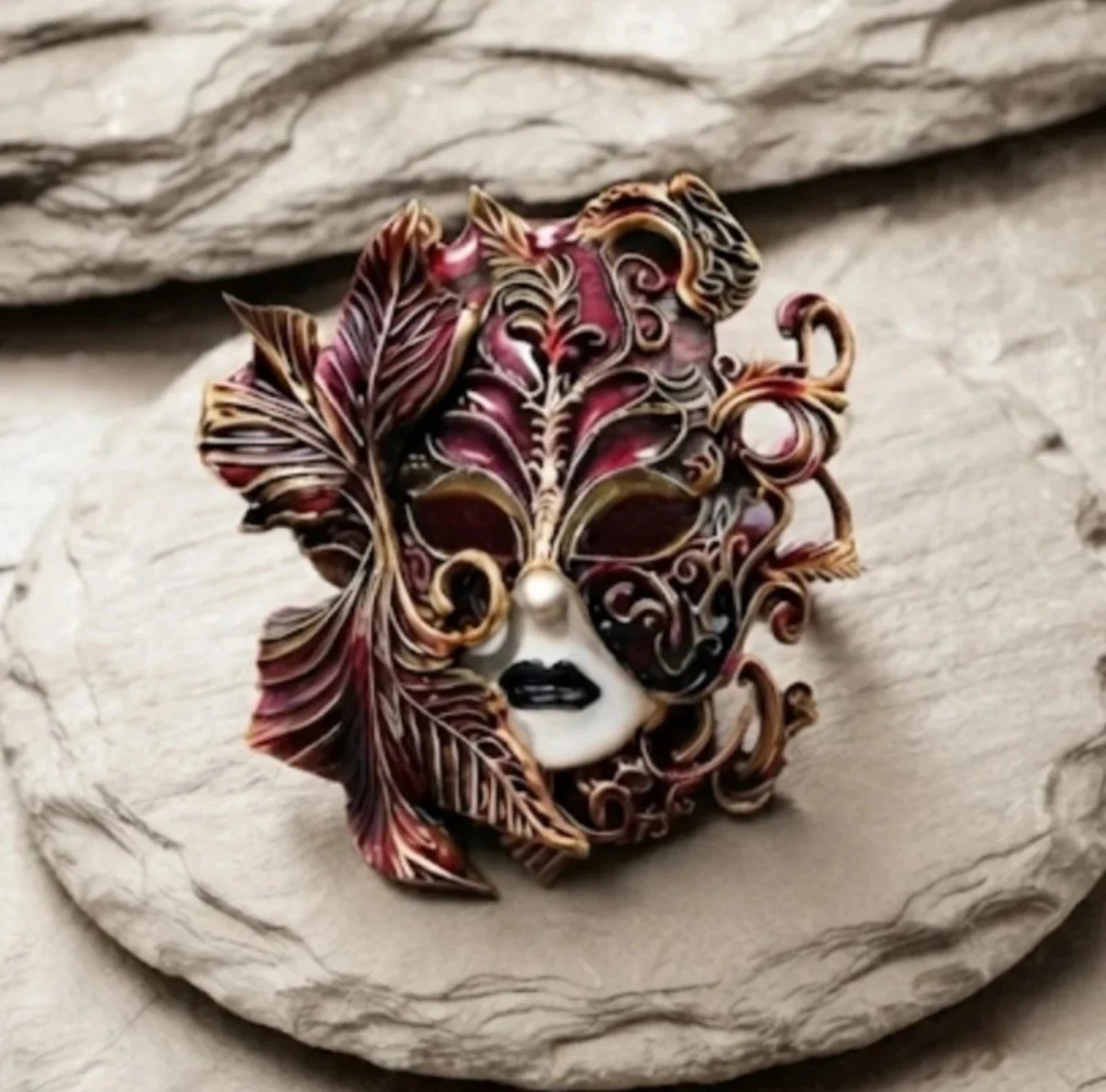 Broche de mascara veneciana